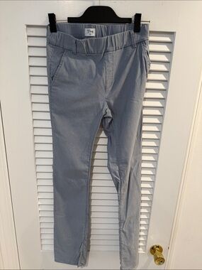 Women’s light/dark gray pinstriped pants.